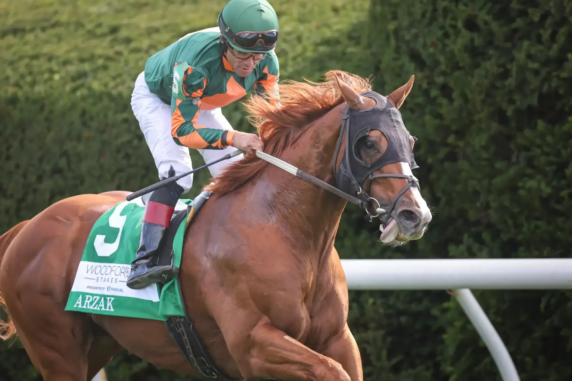Jockey riding horse during a race.